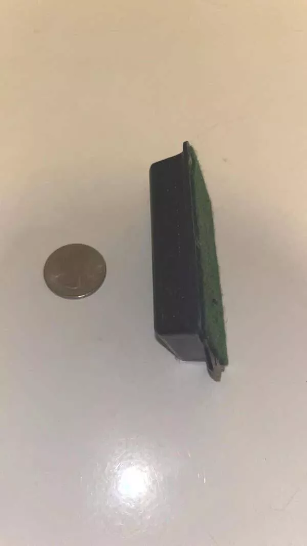 Mysteries solved by the wisdom of the web - #17 Black Plastic Item With Fuzzy Side — Magnetized in a Dryer