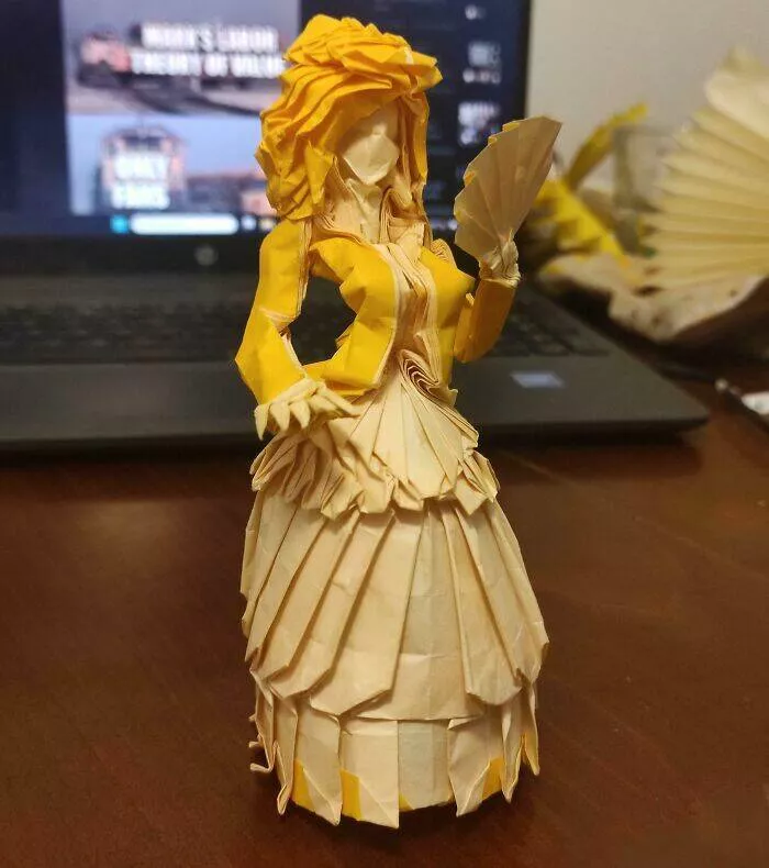 Photos so unreal youd think theyre edited - #4 Incredible Origami Dress Made From a Single Sheet of Paper