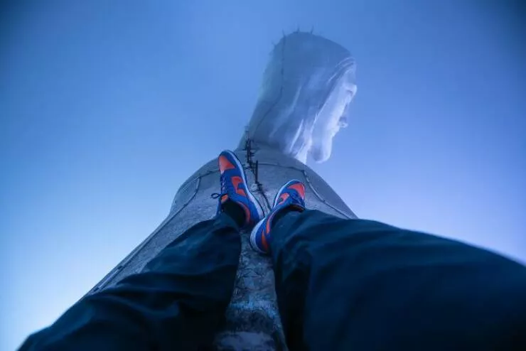 Extraordinary images showing the world from a new perspective - #13 Sitting On Christ The Redeemer's Arm – Sky-High Perspective
