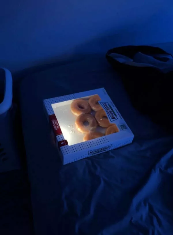 Awesome pics that get better the longer you look - #2 Sunbeam Makes Donut Box Look Like It’s Lit By LED