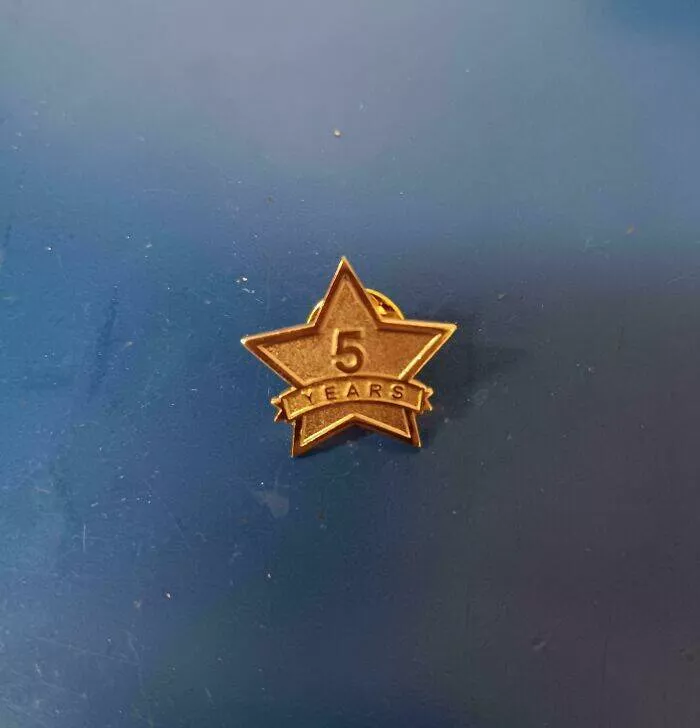 Toxic workplaces exposed through unbelievable photos - #34 5-Year Work Anniversary Pin While Company Plans Layoffs