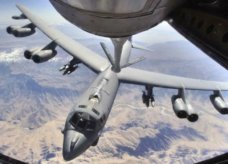 In flight refueling flawless timing above the clouds - #53 
