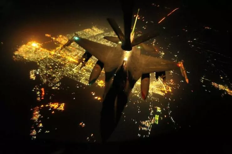 In flight refueling flawless timing above the clouds - #57 