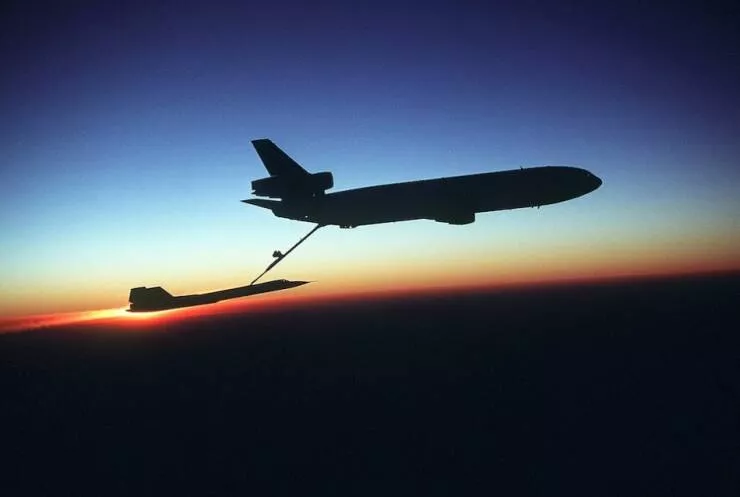 In flight refueling flawless timing above the clouds - #64 