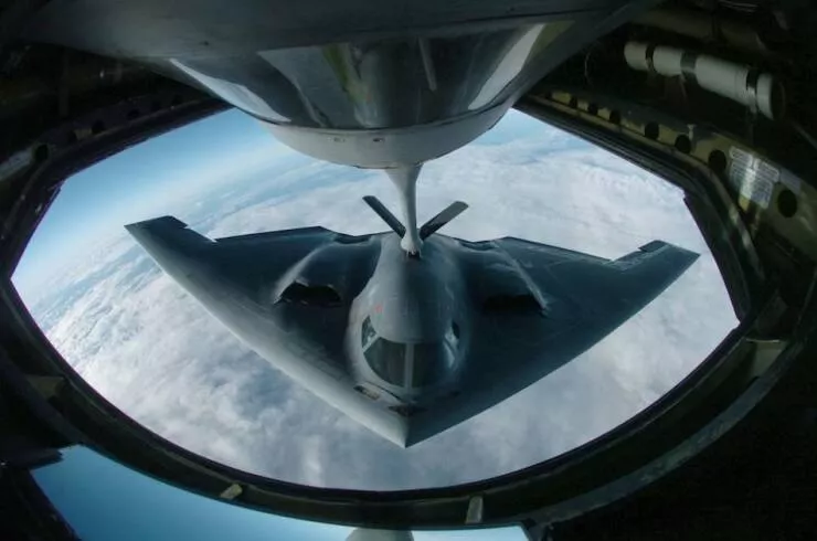 In flight refueling flawless timing above the clouds - #65 