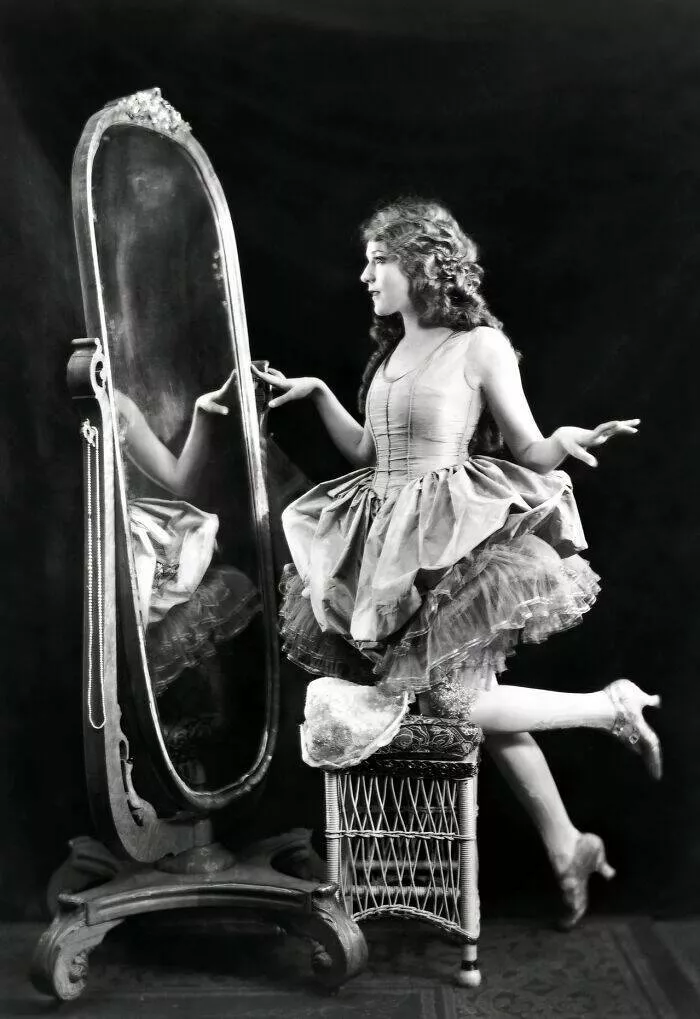 Vintage vixens power poise in 1900s glam - #16 Letitia Felix Captured at Her Table in a Vintage Setting