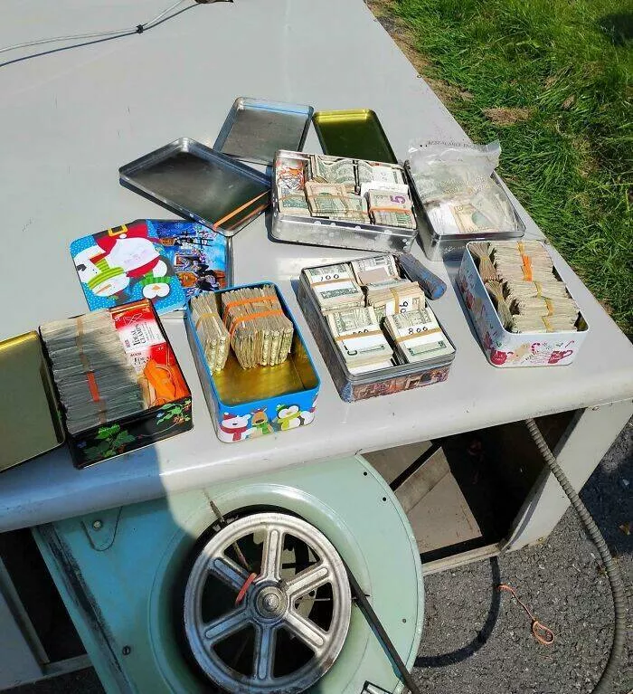 Intriguing photos with amazing stories - #13 Dad Discovers $40,000 Hidden in an Old Heating System
