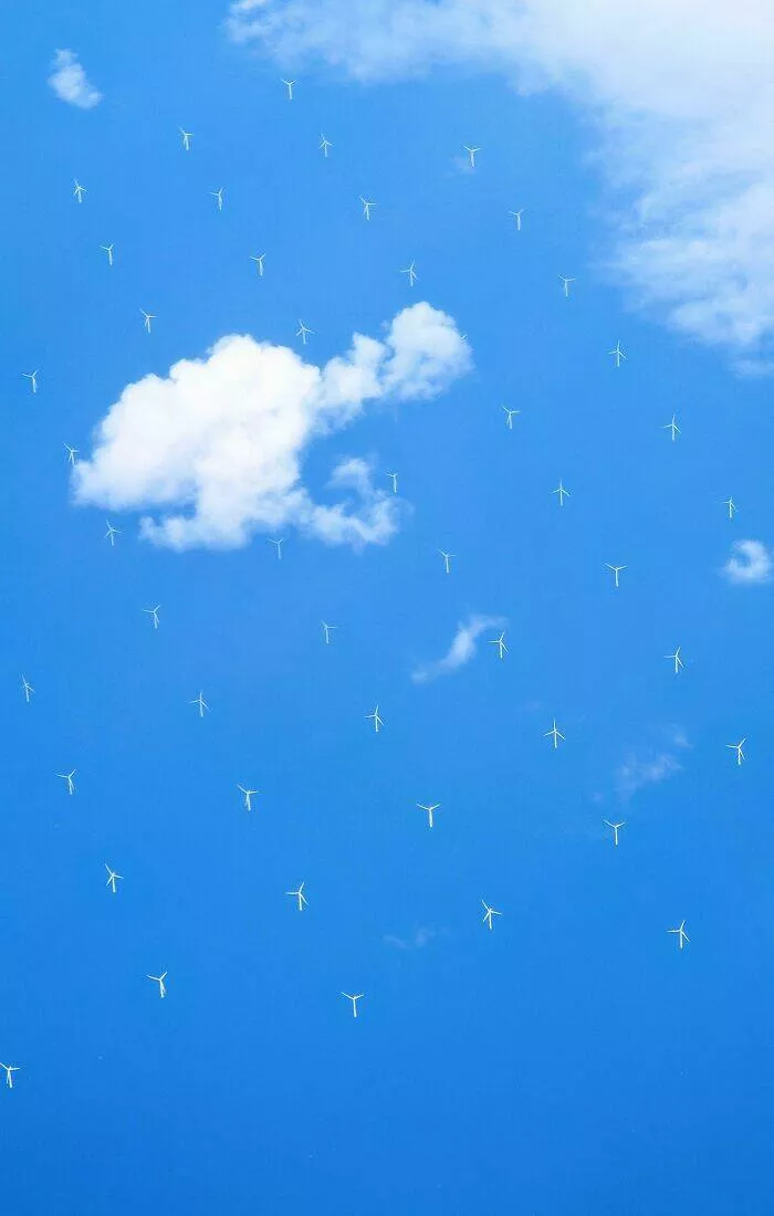Intriguing photos with amazing stories - #15 Wind Turbines Seen from Plane Appear to Float in the Sky