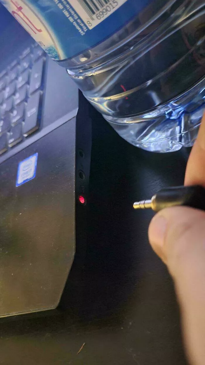 Intriguing photos with amazing stories - #24 Laptop Glows Where the Headphone Port Is Located in Darkness