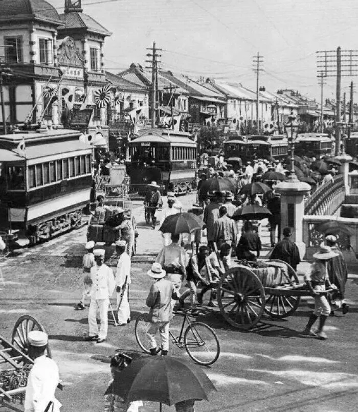 Vintage photos uncovering hidden world stories - #1 Bustling Streets of Tokyo in the Early 20th Century
