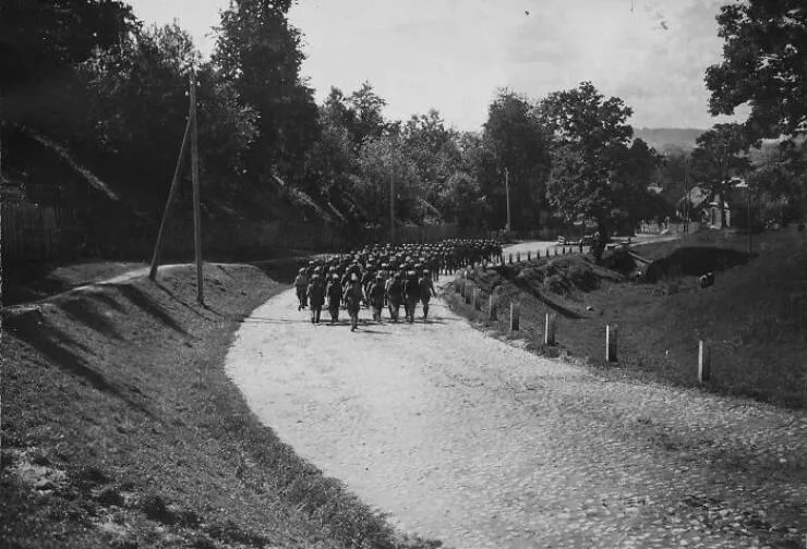 Vintage photos uncovering hidden world stories - #3 Cadets Parade Through Historic Parodos Street, 1920, Kaunas