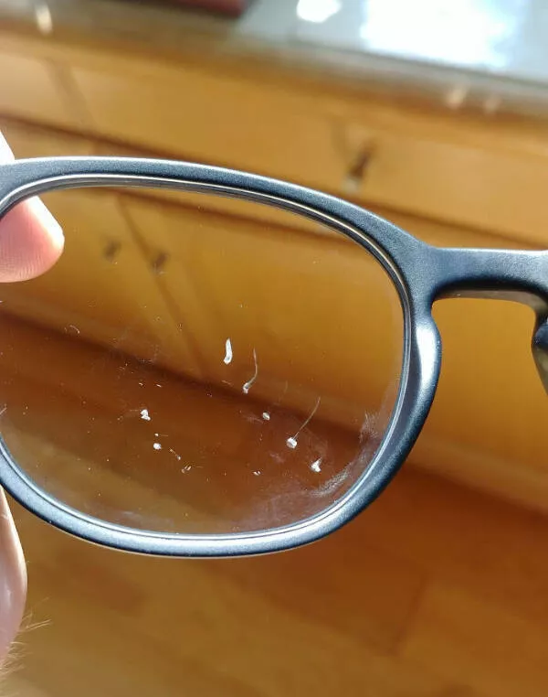 Work the neverending sequel - #8 Got new glasses three weeks ago. The dents are from a high-speed bottle cap from my coworker’s soda.