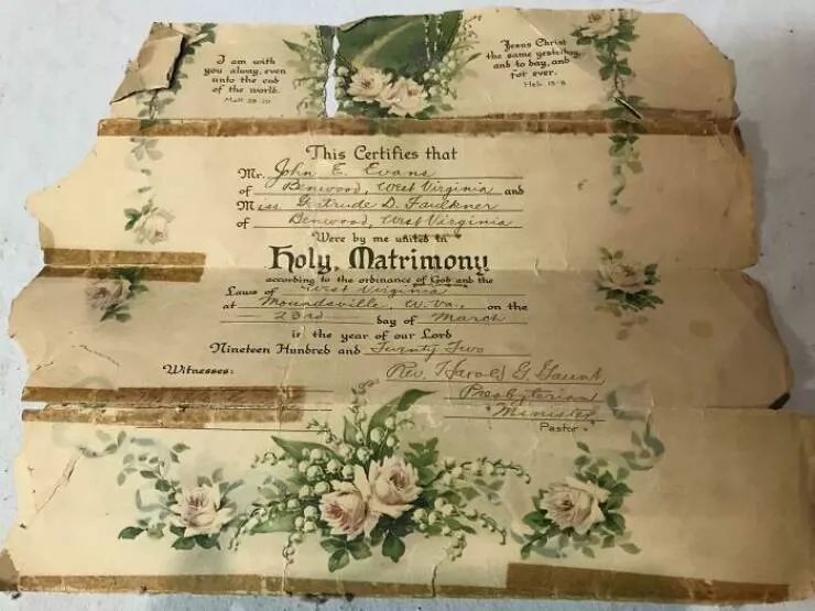 Unusual finds unearthed inside forgotten houses - #11 Found a century-old marriage certificate while removing a basement wall—what a peek into someone’s love story.