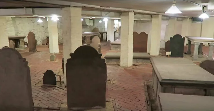 Unusual finds unearthed inside forgotten houses - #6 Stumbled upon a perfectly preserved 1800s cemetery sitting quietly beneath a modern tall building—spooky yet fascinating.