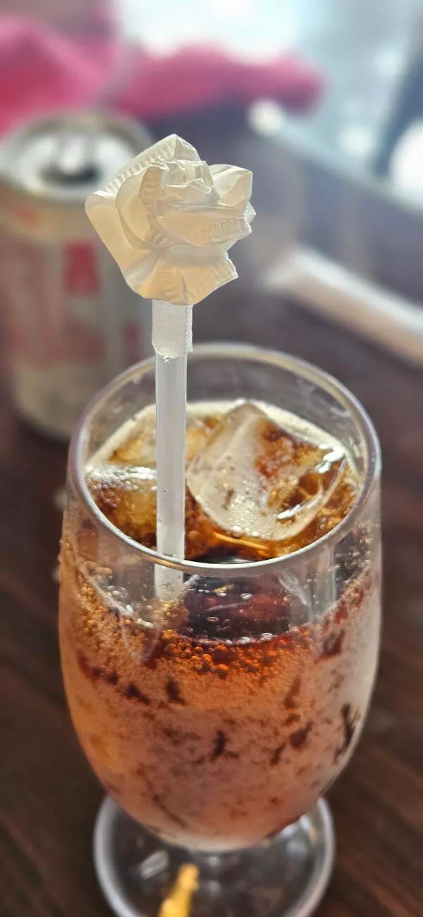 Awesome photos that stop you mid scroll - #21 Straw wrapper folded into a delicate edible-looking paper bloom