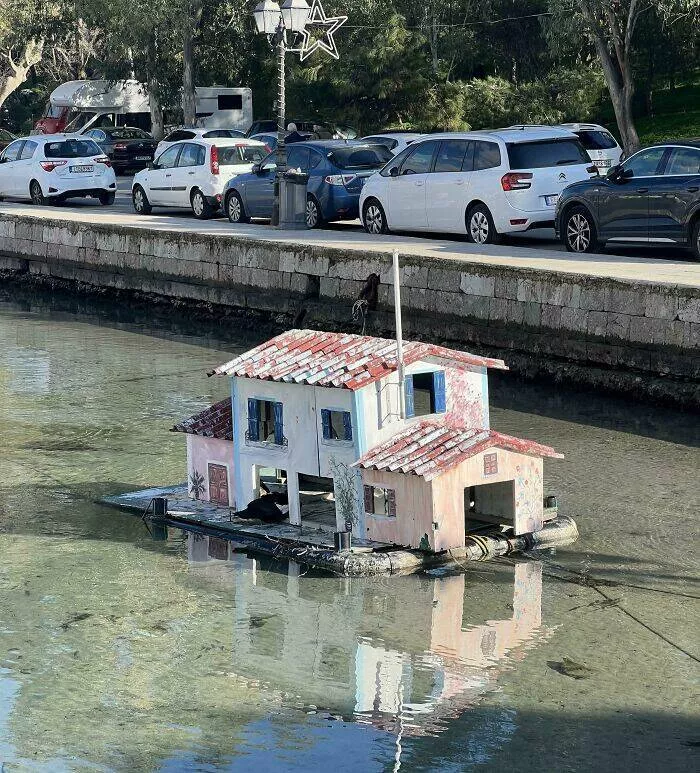 Cool gems from every corner of the globe internets hidden treasures - #9 Tiny duck house docks in a Greek marina—quack-friendly harbor spot