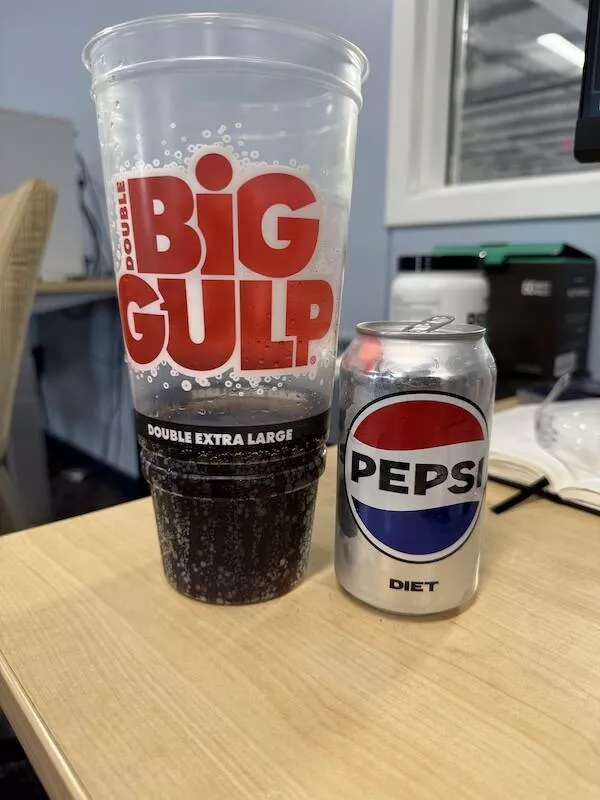 Intriguing photos a gallery of captivating shots - #16 A single can of Pepsi in an enormous Big Gulp cup