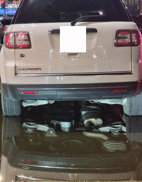 Ordinary scenes extraordinary twist - #20 Water reflection makes car parts look like they're on the ground