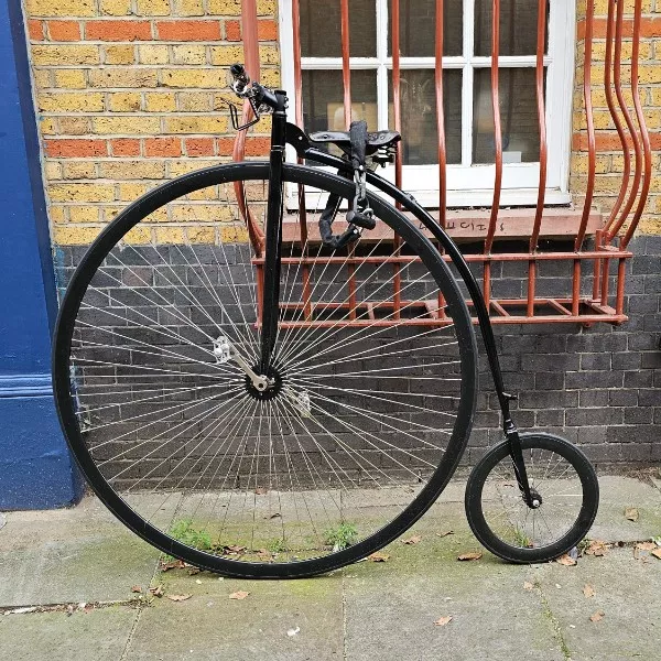 An interesting escape from the mundane - #8 A modern penny-farthing parked outside