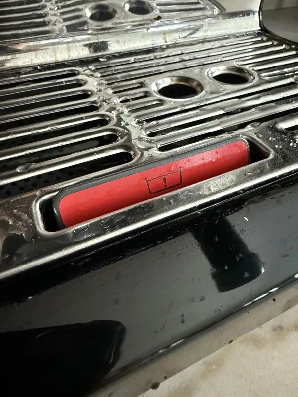 The beauty is in the little things - #10 My espresso machine has a floating warning sign