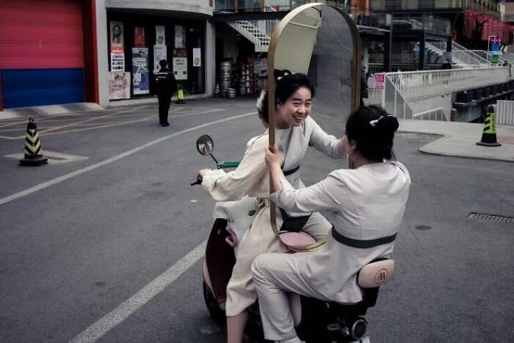 Best of pure street photography awards 2025 - #9 2nd Place Winner Mirror by Chris Yan, China